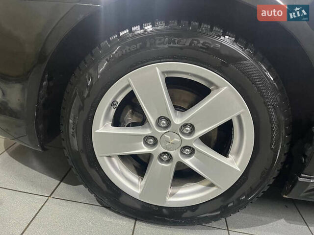 Черный Мицубиси Лансер, объемом двигателя 2 л и пробегом 200 тыс. км за 8000 $, фото 14 на Automoto.ua