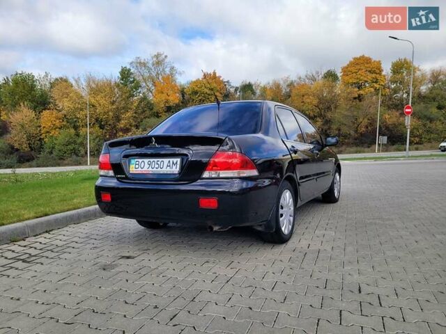 Міцубісі Lancer 2008 у Тернополі на Automoto.ua Чорний Міцубісі Lancer, об'ємом двигуна 1.58 л та пробігом 182 тис. км за 5600 $, фото 4 на Automoto.ua