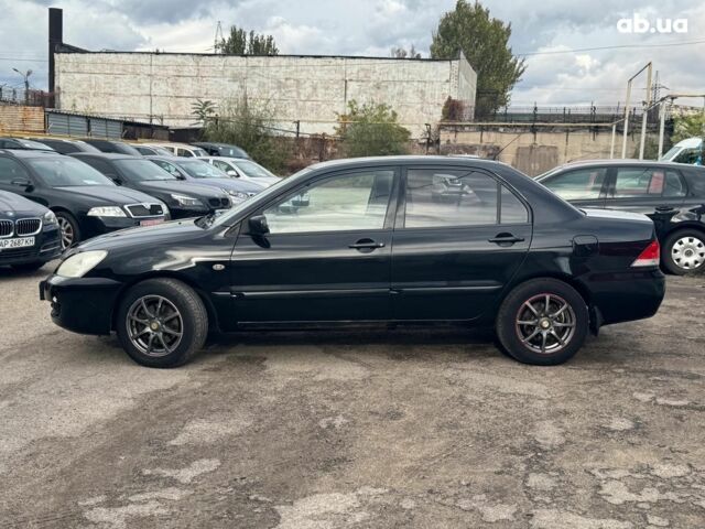 Мицубиси Лансер 2008 в Запорожье на Automoto.ua Черный Мицубиси Лансер, объемом двигателя 1.6 л и пробегом 316 тыс. км за 4290 $, фото 3 на Automoto.ua