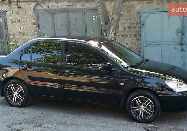 Чорний Міцубісі Lancer, об'ємом двигуна 1.6 л та пробігом 55 тис. км за 6500 $, фото 6 на Automoto.ua