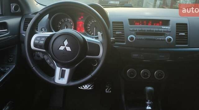 Чорний Міцубісі Lancer, об'ємом двигуна 2 л та пробігом 134 тис. км за 29034 $, фото 11 на Automoto.ua