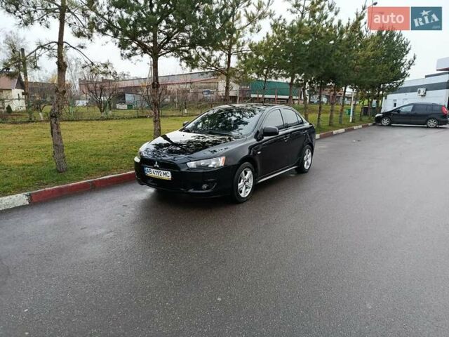 Черный Мицубиси Лансер, объемом двигателя 2 л и пробегом 200 тыс. км за 5100 $, фото 4 на Automoto.ua