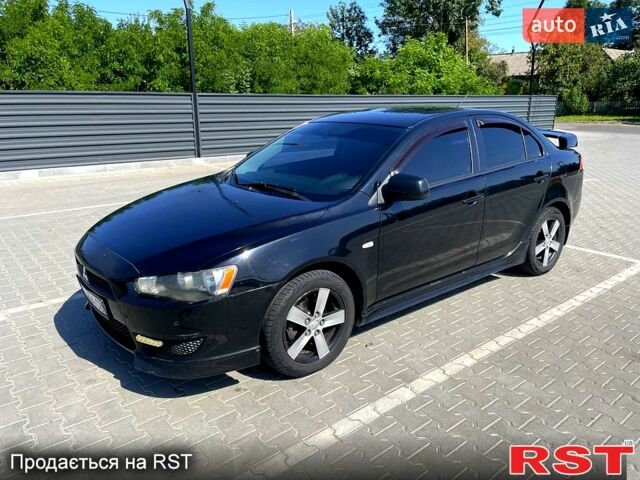 Чорний Міцубісі Lancer, об'ємом двигуна 2 л та пробігом 236 тис. км за 5500 $, фото 2 на Automoto.ua