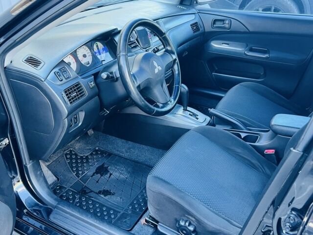 Міцубісі Lancer 2008 у Синельниковом на Automoto.ua Чорний Міцубісі Lancer, об'ємом двигуна 1.6 л та пробігом 230 тис. км за 4500 $, фото 10 на Automoto.ua