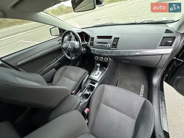 Чорний Міцубісі Lancer, об'ємом двигуна 2 л та пробігом 199 тис. км за 7900 $, фото 16 на Automoto.ua