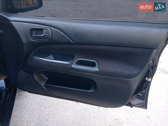 Чорний Міцубісі Lancer, об'ємом двигуна 1.58 л та пробігом 286 тис. км за 4950 $, фото 14 на Automoto.ua