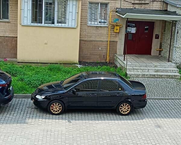 Мицубиси Лансер 2008 в Львове на Automoto.ua Черный Мицубиси Лансер, объемом двигателя 1.58 л и пробегом 200 тыс. км за 5200 $, фото 185 на Automoto.ua