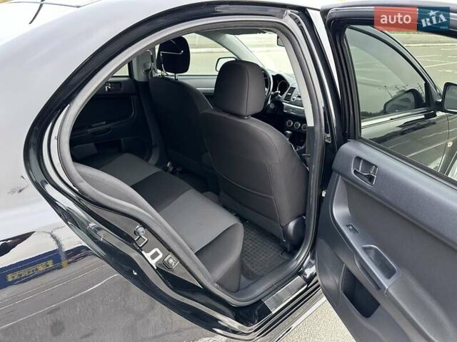 Чорний Міцубісі Lancer, об'ємом двигуна 2 л та пробігом 199 тис. км за 7900 $, фото 23 на Automoto.ua