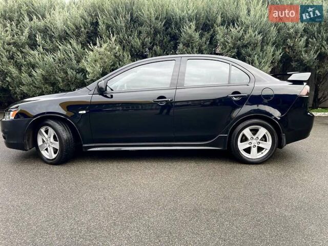 Чорний Міцубісі Lancer, об'ємом двигуна 2 л та пробігом 217 тис. км за 5600 $, фото 3 на Automoto.ua