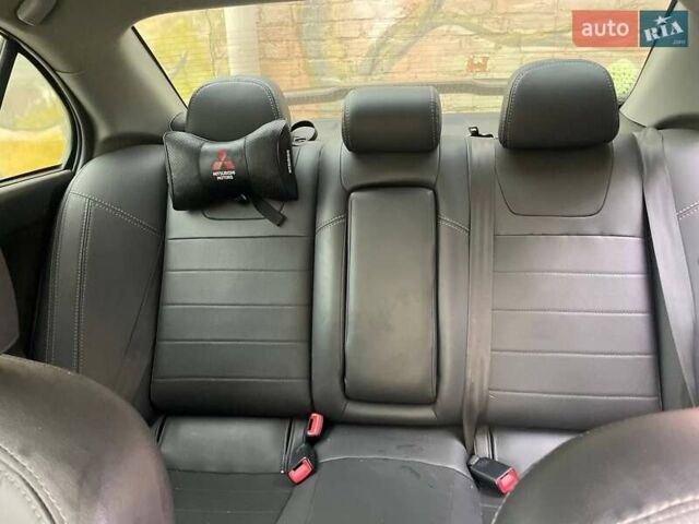 Чорний Міцубісі Lancer, об'ємом двигуна 2 л та пробігом 255 тис. км за 6999 $, фото 8 на Automoto.ua