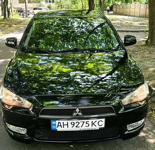 Черный Мицубиси Лансер, объемом двигателя 1.5 л и пробегом 205 тыс. км за 6300 $, фото 5 на Automoto.ua