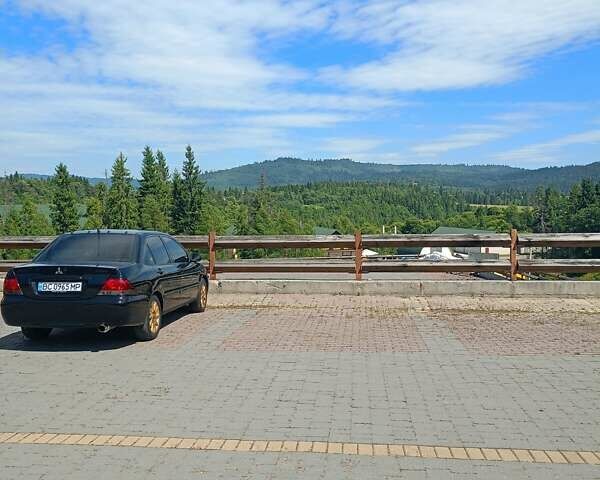 Мицубиси Лансер 2008 в Львове на Automoto.ua Черный Мицубиси Лансер, объемом двигателя 1.58 л и пробегом 200 тыс. км за 5200 $, фото 197 на Automoto.ua
