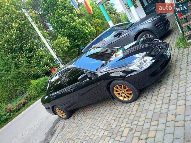 Мицубиси Лансер 2008 в Львове на Automoto.ua Черный Мицубиси Лансер, объемом двигателя 1.58 л и пробегом 200 тыс. км за 5200 $, фото 118 на Automoto.ua