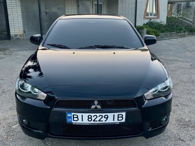 Чорний Міцубісі Lancer, об'ємом двигуна 2 л та пробігом 195 тис. км за 7000 $, фото 6 на Automoto.ua