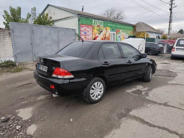 Черный Мицубиси Лансер, объемом двигателя 1.6 л и пробегом 270 тыс. км за 3800 $, фото 3 на Automoto.ua