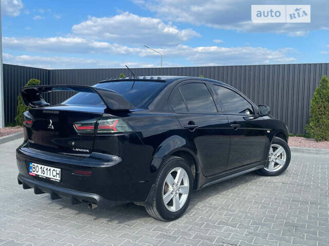 Чорний Міцубісі Lancer, об'ємом двигуна 2 л та пробігом 178 тис. км за 7500 $, фото 3 на Automoto.ua