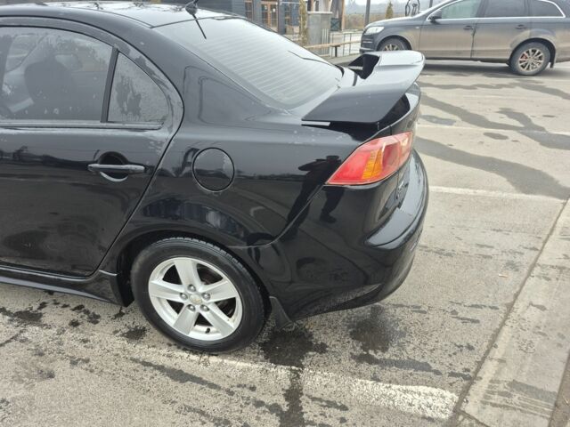 Чорний Міцубісі Lancer, об'ємом двигуна 0 л та пробігом 276 тис. км за 5750 $, фото 6 на Automoto.ua