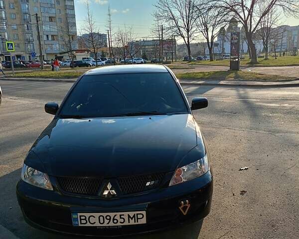 Мицубиси Лансер 2008 в Львове на Automoto.ua Черный Мицубиси Лансер, объемом двигателя 1.58 л и пробегом 200 тыс. км за 5200 $, фото 84 на Automoto.ua
