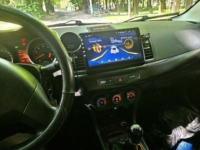 Чорний Міцубісі Lancer, об'ємом двигуна 1.5 л та пробігом 205 тис. км за 6300 $, фото 10 на Automoto.ua