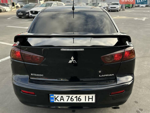 Чорний Міцубісі Lancer, об'ємом двигуна 2 л та пробігом 290 тис. км за 5900 $, фото 13 на Automoto.ua