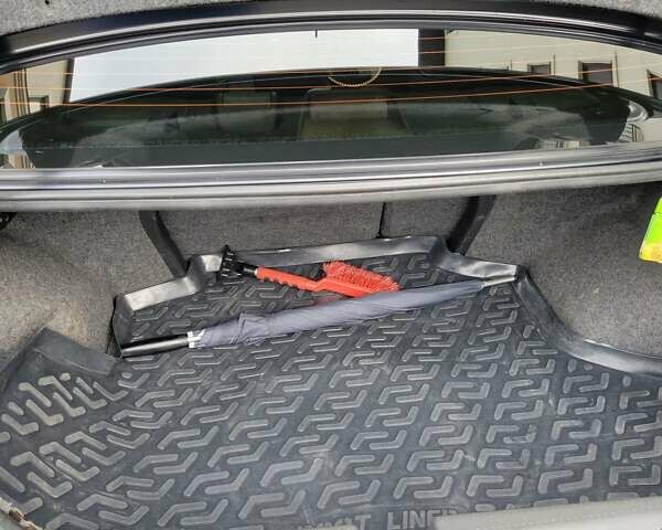 Чорний Міцубісі Lancer, об'ємом двигуна 1.58 л та пробігом 334 тис. км за 4750 $, фото 10 на Automoto.ua