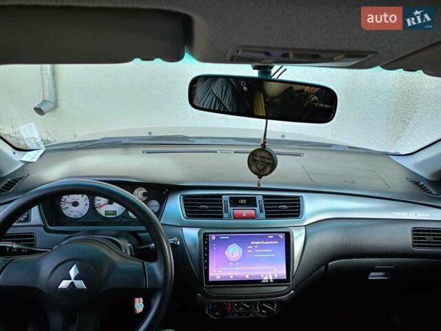 Мицубиси Лансер 2008 в Львове на Automoto.ua Черный Мицубиси Лансер, объемом двигателя 1.58 л и пробегом 200 тыс. км за 5200 $, фото 97 на Automoto.ua