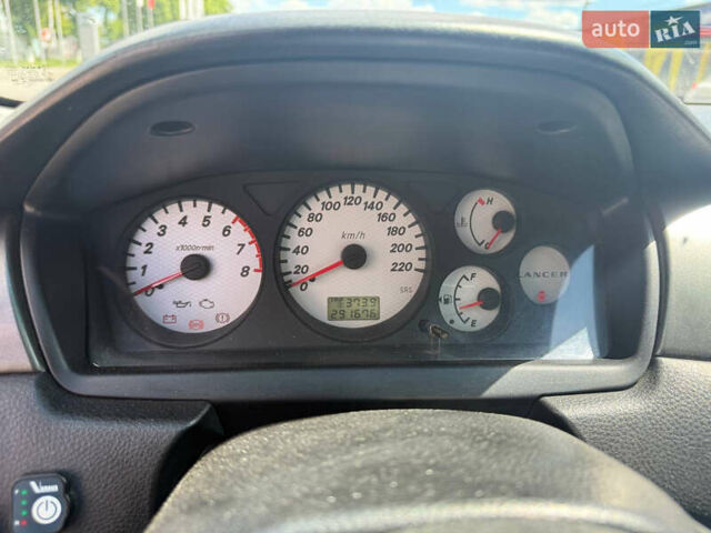 Чорний Міцубісі Lancer, об'ємом двигуна 1.6 л та пробігом 292 тис. км за 3600 $, фото 21 на Automoto.ua