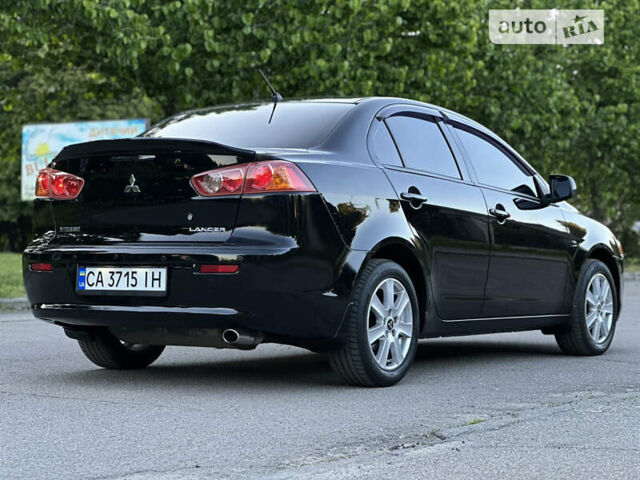 Чорний Міцубісі Lancer, об'ємом двигуна 1.5 л та пробігом 232 тис. км за 6000 $, фото 16 на Automoto.ua