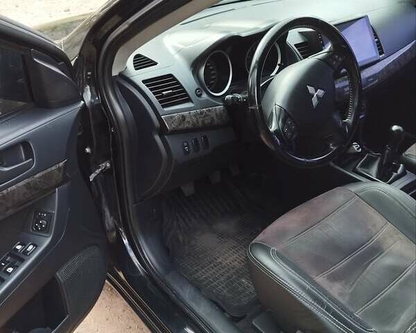 Чорний Міцубісі Lancer, об'ємом двигуна 1.5 л та пробігом 210 тис. км за 5800 $, фото 4 на Automoto.ua