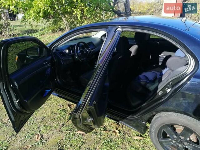 Мицубиси Лансер 2008 в Киеве на Automoto.ua Черный Мицубиси Лансер, объемом двигателя 2 л и пробегом 196 тыс. км за 5500 $, фото 9 на Automoto.ua