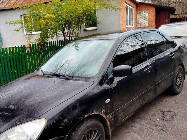 Чорний Міцубісі Lancer, об'ємом двигуна 1.6 л та пробігом 126 тис. км за 4500 $, фото 2 на Automoto.ua