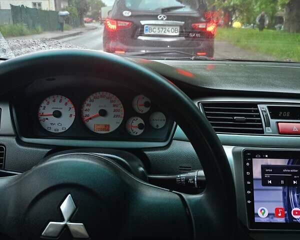 Мицубиси Лансер 2008 в Львове на Automoto.ua Черный Мицубиси Лансер, объемом двигателя 1.58 л и пробегом 200 тыс. км за 5200 $, фото 40 на Automoto.ua