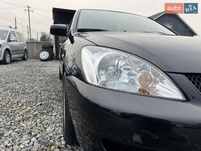 Черный Мицубиси Лансер, объемом двигателя 1.58 л и пробегом 202 тыс. км за 4100 $, фото 20 на Automoto.ua