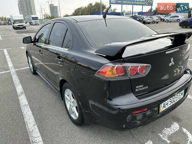 Чорний Міцубісі Lancer, об'ємом двигуна 2 л та пробігом 199 тис. км за 7900 $, фото 8 на Automoto.ua