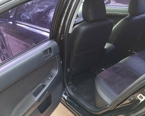 Чорний Міцубісі Lancer, об'ємом двигуна 1.5 л та пробігом 210 тис. км за 5800 $, фото 3 на Automoto.ua