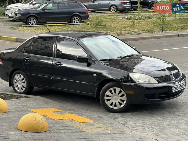 Черный Мицубиси Лансер, объемом двигателя 1.6 л и пробегом 167 тыс. км за 4850 $, фото 6 на Automoto.ua