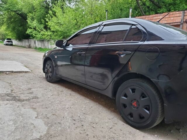 Чорний Міцубісі Lancer, об'ємом двигуна 2 л та пробігом 200 тис. км за 5300 $, фото 4 на Automoto.ua