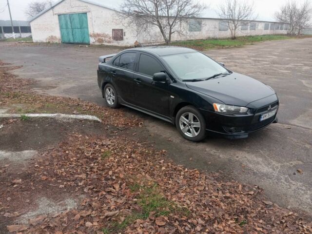 Чорний Міцубісі Lancer, об'ємом двигуна 2 л та пробігом 232 тис. км за 5000 $, фото 6 на Automoto.ua