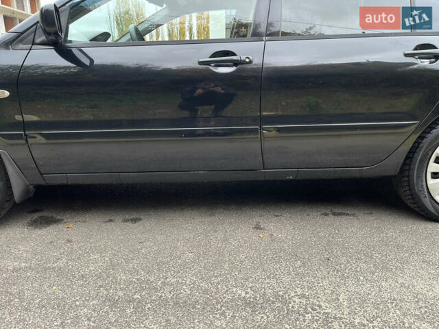 Чорний Міцубісі Lancer, об'ємом двигуна 1.58 л та пробігом 192 тис. км за 4500 $, фото 24 на Automoto.ua