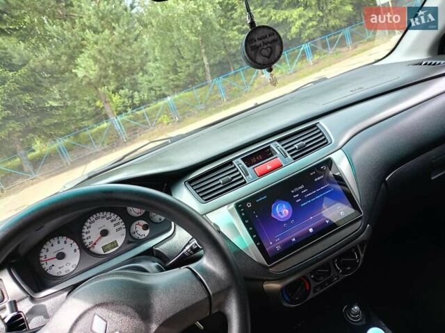 Мицубиси Лансер 2008 в Львове на Automoto.ua Черный Мицубиси Лансер, объемом двигателя 1.58 л и пробегом 200 тыс. км за 5200 $, фото 181 на Automoto.ua