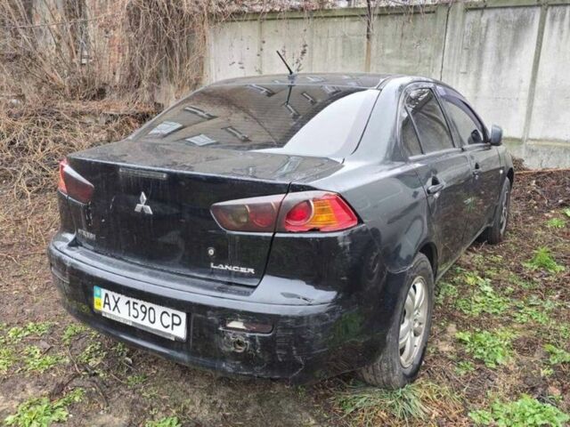 Черный Мицубиси Лансер, объемом двигателя 1.5 л и пробегом 300 тыс. км за 2500 $, фото 1 на Automoto.ua