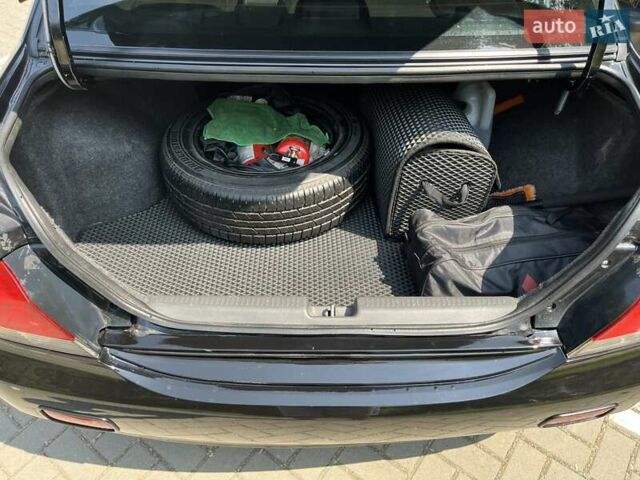 Чорний Міцубісі Lancer, об'ємом двигуна 1.6 л та пробігом 296 тис. км за 4200 $, фото 53 на Automoto.ua