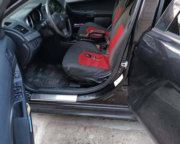 Черный Мицубиси Лансер, объемом двигателя 1.5 л и пробегом 167 тыс. км за 5500 $, фото 3 на Automoto.ua