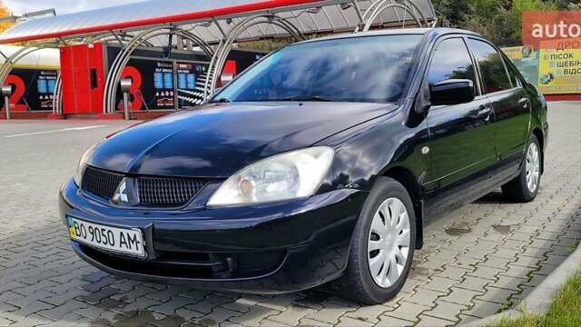 Міцубісі Lancer 2008 у Тернополі на Automoto.ua Чорний Міцубісі Lancer, об'ємом двигуна 1.58 л та пробігом 182 тис. км за 5600 $, фото 7 на Automoto.ua