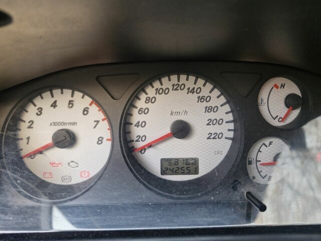 Черный Мицубиси Лансер, объемом двигателя 1.6 л и пробегом 243 тыс. км за 2900 $, фото 1 на Automoto.ua