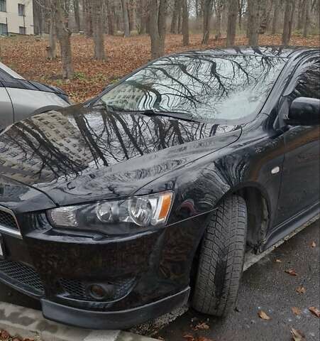 Чорний Міцубісі Lancer, об'ємом двигуна 2 л та пробігом 302 тис. км за 7200 $, фото 4 на Automoto.ua