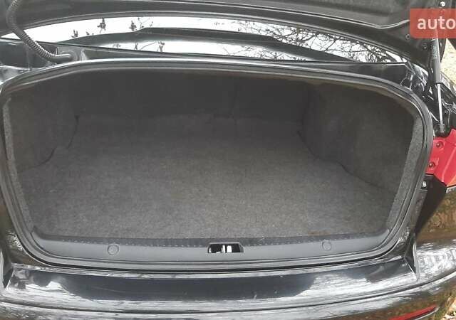 Черный Мицубиси Лансер, объемом двигателя 2 л и пробегом 63 тыс. км за 8000 $, фото 3 на Automoto.ua