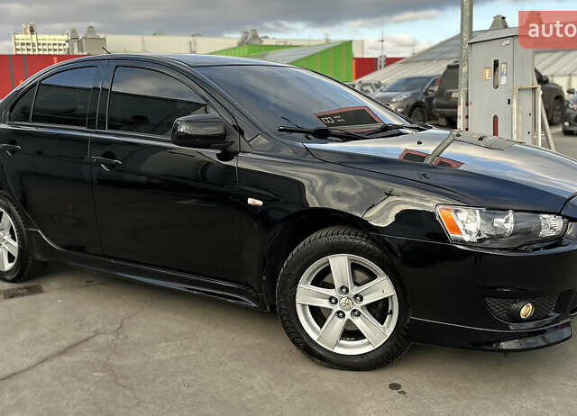 Чорний Міцубісі Lancer, об'ємом двигуна 2 л та пробігом 290 тис. км за 5900 $, фото 8 на Automoto.ua