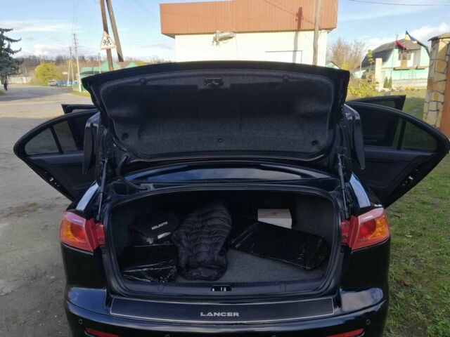 Міцубісі Lancer 2008 у Києві на Automoto.ua Чорний Міцубісі Lancer, об'ємом двигуна 2 л та пробігом 196 тис. км за 5500 $, фото 21 на Automoto.ua