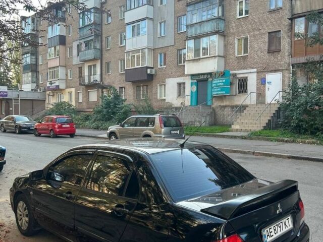 Міцубісі Lancer 2008 у Кривому Розі на Automoto.ua Чорний Міцубісі Lancer, об'ємом двигуна 1.6 л та пробігом 230 тис. км за 4380 $, фото 2 на Automoto.ua